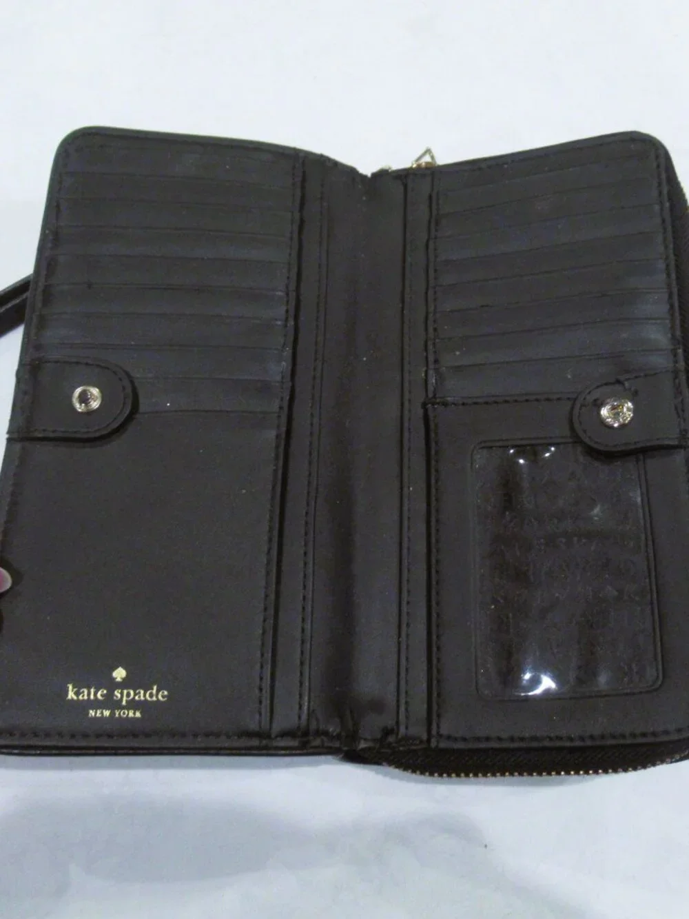 Kate Spade New York black leather wristlet / wallet